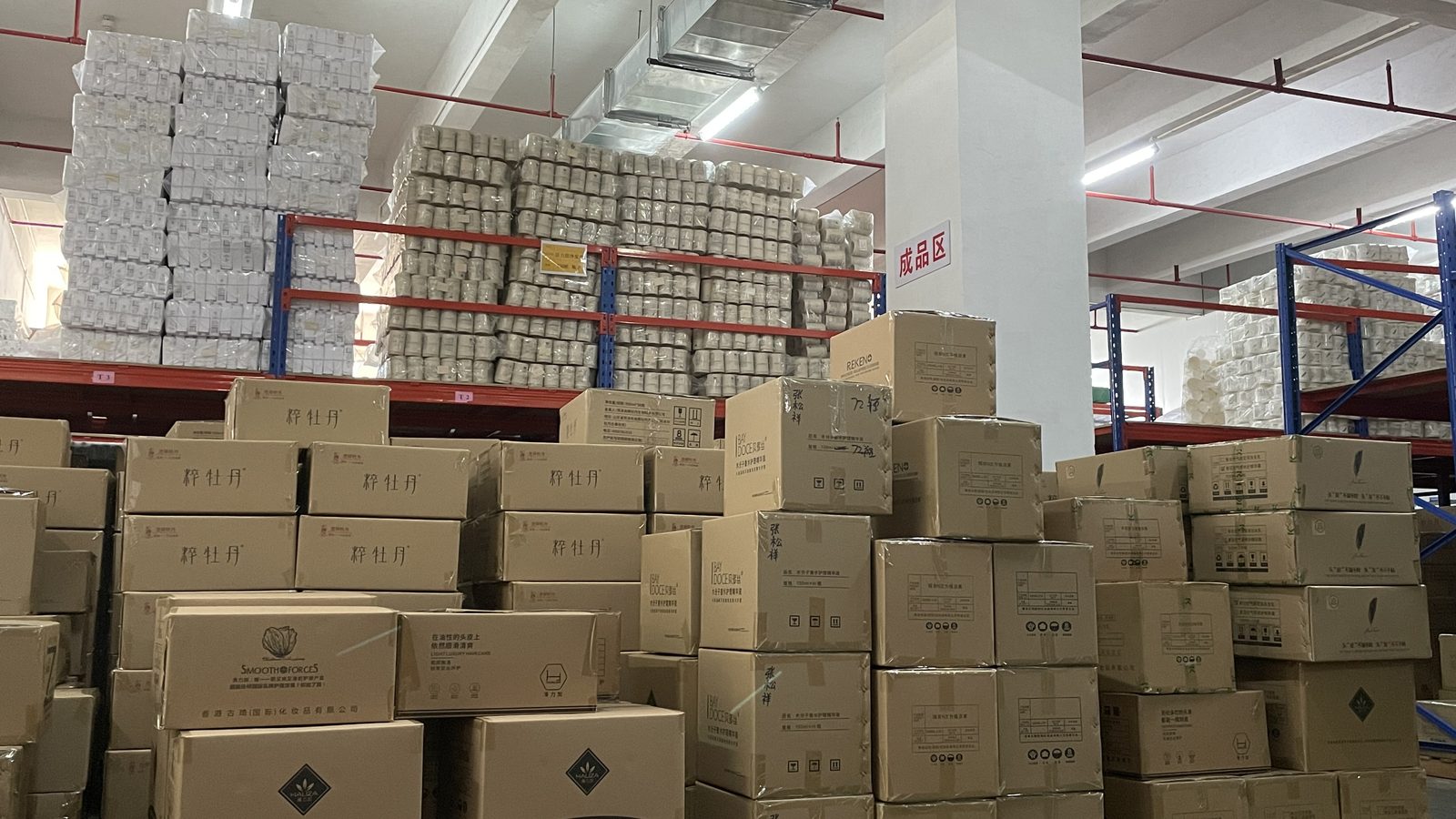 Cartons stacked in a finished-goods warehouse awaiting dispatch